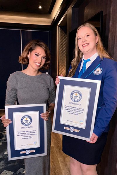Raye surprised backstage with GWR certificates marking her iconic BRIT Awards success